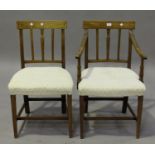 A set of six George IV mahogany inlaid bar back dining chairs, comprising two carvers and four