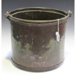 A 19th century patinated copper cylindrical coal bucket with studded seams and swing handle,