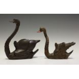 An unusual late 19th/early 20th century Swiss Black Forest carved softwood model of a swan with