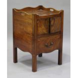 A George III mahogany night table with gallery top, fitted with a cupboard above a pot drawer,