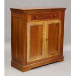 A modern French cherry 'Grange' cabinet with single drawer above a cupboard enclosed by two doors,