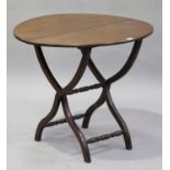 A Victorian mahogany circular folding coaching table, height 74cm, diameter 81cm.Buyer’s Premium