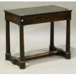 A Regency flame mahogany pier table with black marble top above a single drawer, raised on turned