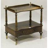 A mid-Victorian rosewood two-tier whatnot, the two serpentine levels on turned supports, the base