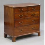 A late George III mahogany chest of two short and three long drawers, on bracket feet, height