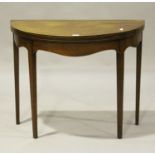 A George III mahogany demi-lune fold-over card table with chequer stringing, on square tapering