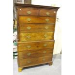 A George III mahogany chest-on-chest, the dentil moulded pediment above two short and six long