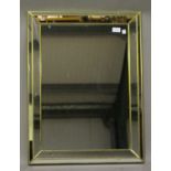 A 20th century gilt framed sectional wall mirror, 75cm x 56cm.Buyer’s Premium 29.4% (including VAT @