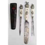 A 19th century Continental bone handled and nickel mounted three-piece trousse cutlery set,