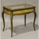 A late 19th century Rococo Revival rosewood and foliate inlaid bijouterie table, the hinged top
