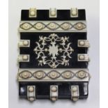 A late 19th century Continental horn and ivory mounted card case with strapwork and pierced