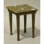 An early 20th century Swiss Art Nouveau walnut stool, the top carved with an edelweiss spray and