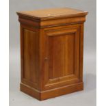 A modern French cherry 'Grange' cabinet with concealed frieze drawer above a cupboard, on a plinth