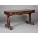 A Regency rosewood rectangular library table, in the manner of Gillows, fitted with two frieze