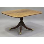 A late George III mahogany rectangular tip-top breakfast table, raised on a turned column and reeded