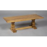 An early/mid-20th century Arts and Crafts style oak diminutive model of a refectory table,
