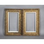 A pair of Art Nouveau gilt composition rectangular frames, each wide section moulded with overall