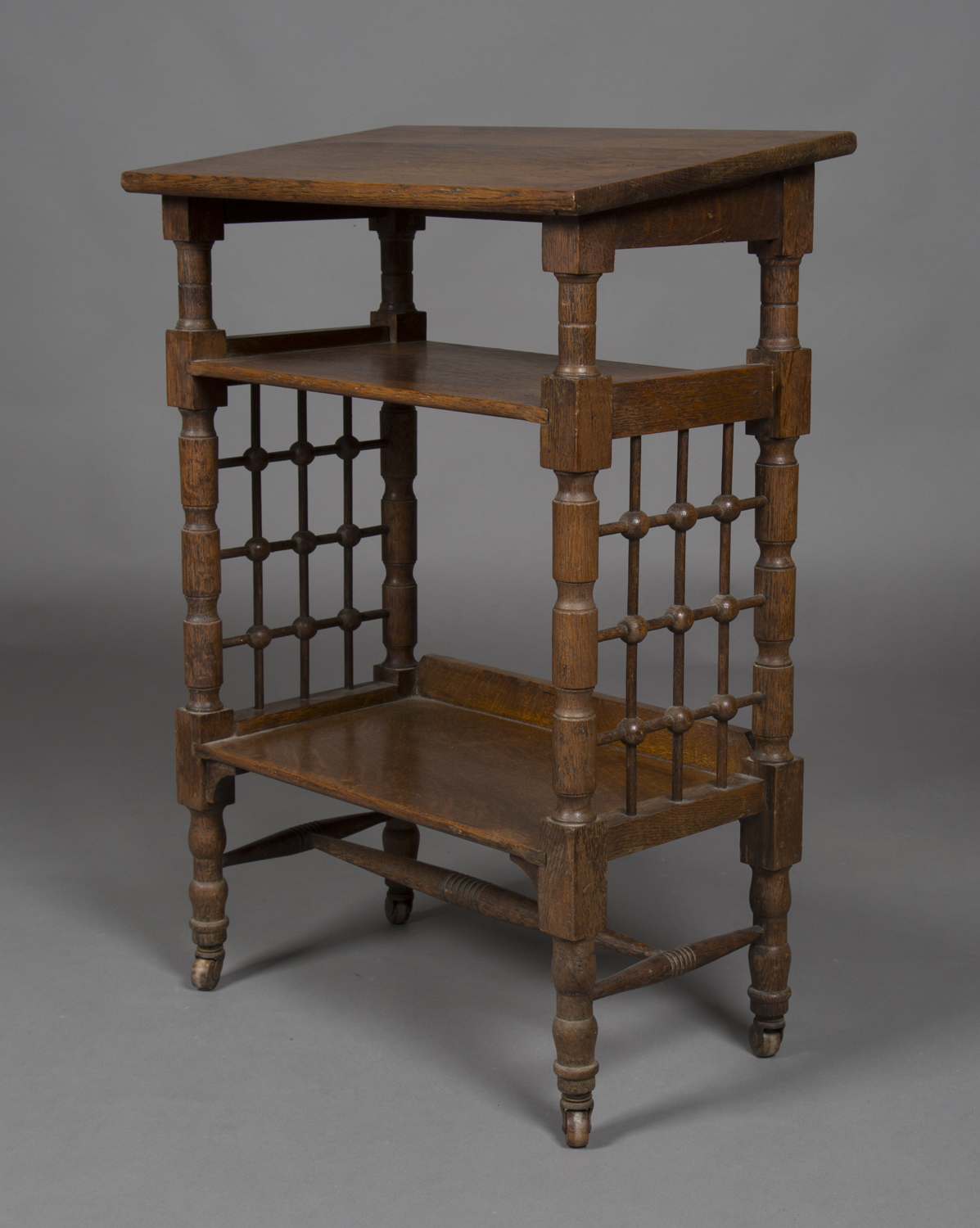 An Edwardian Arts and Crafts oak reading table, designed by Leonard Wyburd for Liberty & Co, the - Image 2 of 2