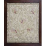 A late 19th/early 20th century Arts and Crafts silkwork panel, worked in pale silks with an