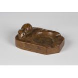 A Robert 'Mouseman' Thompson oak ashtray, the top carved with typical mouse signature, length 10.