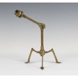 A late Victorian Aesthetic Movement brass adjustable table lamp, probably designed by W.A.S. Benson,