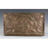 An Edwardian Arts and Crafts rectangular copper tray, worked with a central initial 'M', flanked