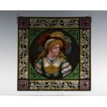 A 19th century stained and leaded glass square portrait panel, the circular reserve finely painted