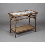 A late 19th century Aesthetic Movement bamboo framed two-tier occasional table, the top inset with