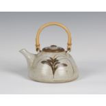 A David Leach Lowerdown Pottery stoneware teapot and cover, painted to each side with a stylized