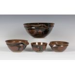 A set of three David Lloyd Jones studio pottery stacking bowls, each of flared circular shape with