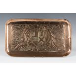 An early 20th century Arts and Crafts rectangular copper tray, probably Newlyn, worked with a
