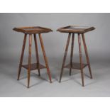 A pair of late Victorian Aesthetic Movement mahogany plant stand/occasional tables, the galleried