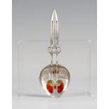 A Liberty & Co 'Cymric' silver and enamelled caddy spoon, designed by Archibald Knox,