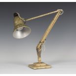 A mid-20th century 1227 model anglepoise lamp by Herbert Terry & Sons, with a marbled creamy gold
