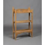 An Edwardian Arts and Crafts oak three-tier bookshelf, attributed to Wylie & Lochhead, the gallery