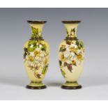 A pair of Doulton faience pottery vases, dated 1898, the ovoid bodies decorated by Mary M. Arding,