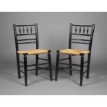 A pair of late 19th/early 20th century Arts and Crafts ebonized ash Sussex side chairs, probably