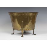 A late Victorian Arts and Crafts brass coal bucket by Birmingham Guild of Handicraft, the tapering
