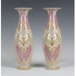A pair of Royal Doulton Lambeth stoneware Art Nouveau vases, early 20th century, decorated by