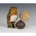 A Chelsea studio pottery model of an owl, mid-20th century, the naturalistic bird perched on a green