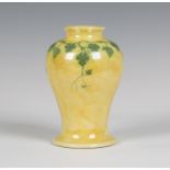 A Ruskin pottery lustre vase, early 20th century, the baluster body painted with trailing green