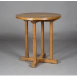 An early/mid-20th century Arts and Crafts style oak circular occasional table, in the manner of