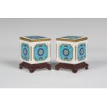 A pair of Minton porcelain chinoiserie style boxes and covers, circa 1870, designed by Christopher