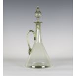 A Powell Whitefriars sea green tinted glass claret jug and stopper, originally designed 1880s, the