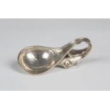 A George V Arts and Crafts silver caddy spoon, the hammered bowl issuing a loop handle, inscribed '