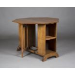 An early 20th century Arts and Crafts oak drop-flap centre table, possibly Cotswold School, the