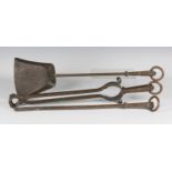 A late 19th/early 20th century Arts and Crafts patinated copper three-piece fire tool set,