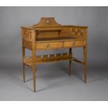 An Edwardian Arts and Crafts oak writing desk, in the manner of Shapland & Petter of Barnstaple, the