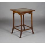 An early 20th century Arts and Crafts walnut framed occasional table, possibly Cotswold School,