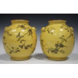 A pair of Chinese style yellow ground porcelain vases, late 19th century, of globular form with